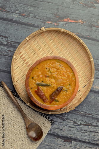Indian traditional food Mung Dal Tadka Curry served for rice and chapati. Also called Dal Tadka Curry , Dal Sambar, Dal khichadi or Khichdi Tasty Indian recipe made of yellow moong dal.