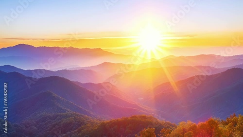 A serene mountain landscape is shown in closeup the rising sun casting a warm glow over the rolling hills and valleys. This is a place believed to hold powerful healing energy photo