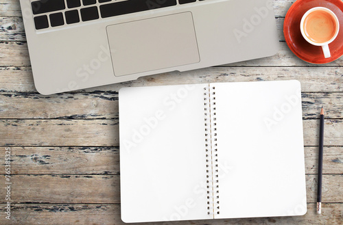 Top view with glasses and notebook on wood table background in office workplace. photo