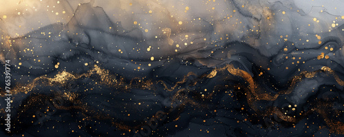 Black and gold abstract watercolor background with sparks and stars. photo