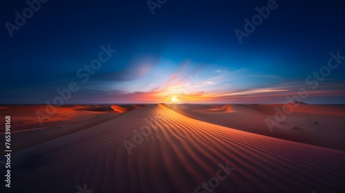 In the desert expanses, true beauty and silence are revealed: golden sand dunes, illuminated by the last rays of sunset, envelop the environment with a unique atmosphere of tranquility and grandeur. © Iaroslav