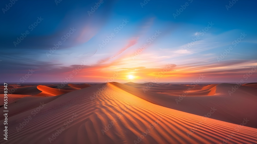  Against the background of desert horizons illuminated by the colors of sunset, golden sand dunes look like a work of art in which every grain of sand emphasizes the beauty
