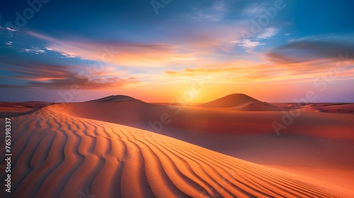 The desert expanses  shrouded in golden shades of sunset  have extraordinary beauty and tranquility  which makes you forget yourself in a moment of peace and harmony with the surrounding world.