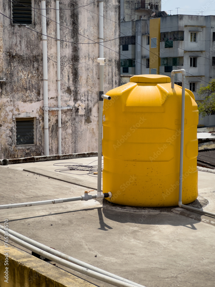 View of overhead water tank for storing the water needs for the house. View of overhead water tank for storing the water needs for the house.