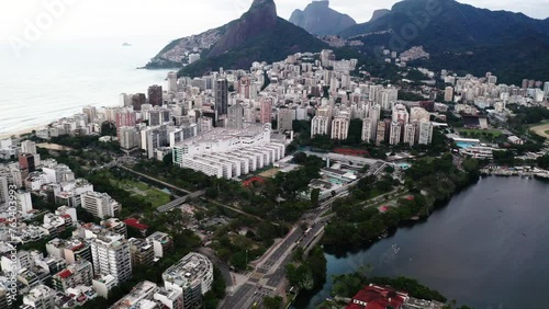 Aerial Tilt Up Backward Scenic View Of Rodrigo De Freitas Lagoon By Residential City - Rio de Janeiro, Brazil photo