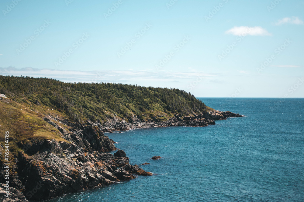 Rocky coastline landscape surrounded by blue waters