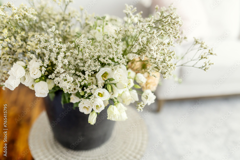 Overhead image of white and green floral arrangement