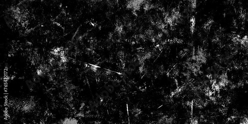 Abstract Dark black stone wall grunge aged rough texture background. closeup texture of black color. Gray concrete cracked walls in the background. White and black messy wall stucco texture background