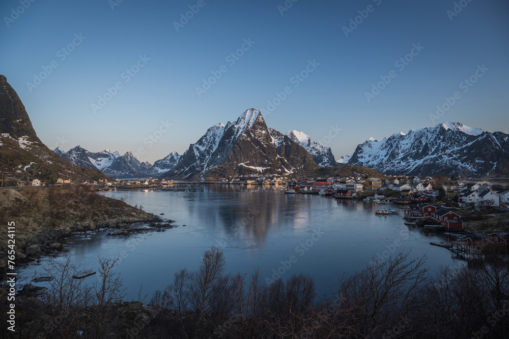 The riverside view of Reine city with a reflection on Morning
