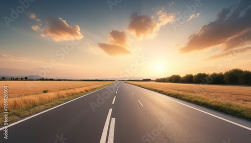 panoramic view of nice summer empty road on sunset