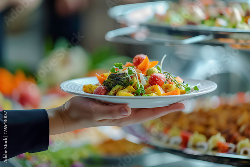 Businessman holding plate with food. Vegetarian catering concept