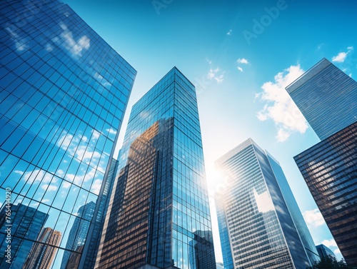 a group of tall buildings with blue sky