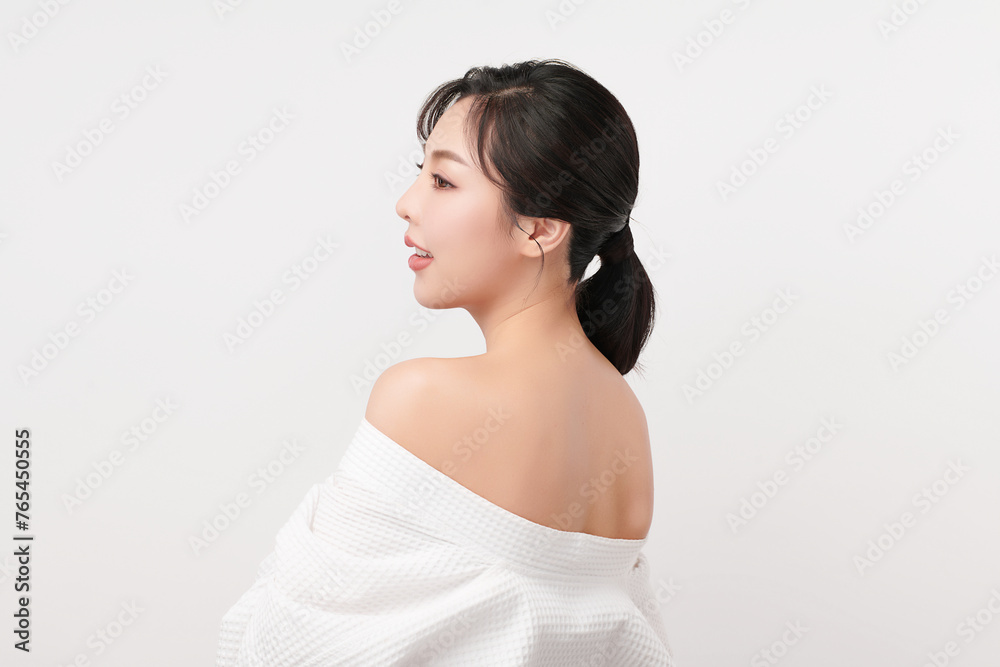 Beautiful young asian woman back view with clean fresh skin on white background, Face care, Facial treatment, Cosmetology, beauty and spa, Asian women portrait. Beautiful young asian woman back view with clean fresh skin on white background, Face care, Facial treatment, Cosmetology, beauty and spa, Asian women portrait.
