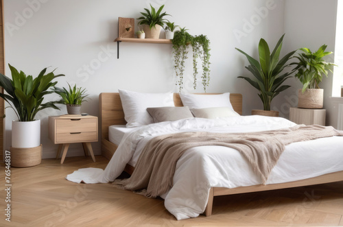 Interesting corner in a home garden, bedroom in light tones with wooden elements. Featuring: bed, parquet floor, and plenty of potted houseplants. Urban jungle interior design. Biophilia concept. © Anna