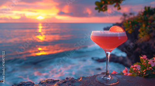 A cocktail glass filled with a vibrant concoction, set against the backdrop of a stunning sunset over the horizon of a serene beach.