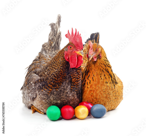 Two chickens and easter eggs.
