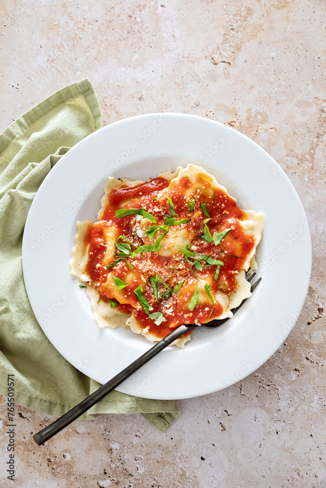 Flat lay of ravioli al pomodoro Flat lay of ravioli al pomodoro