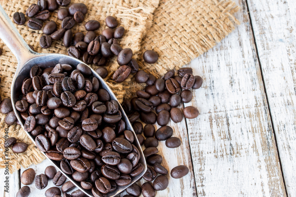 Big stainless steel scoop of coffee beans Big stainless steel scoop of coffee beans