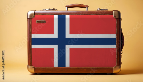 Norway flag on old vintage leather suitcase with national concept. Retro brown luggage with copy space text.