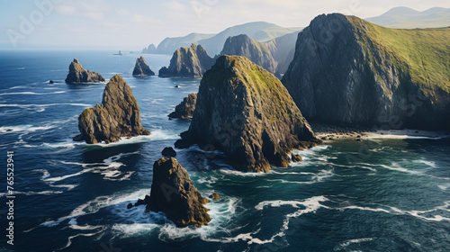 A rugged coastline dotted with sea stacks and natural