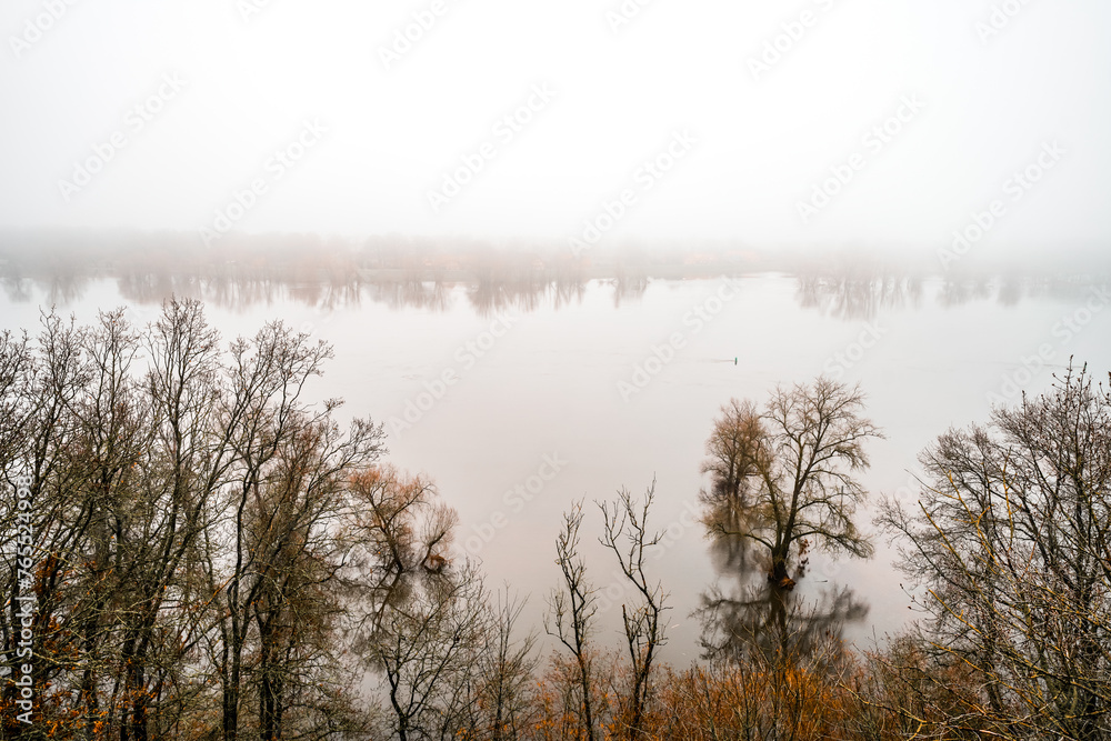 Fototapeta premium Landscape on the Elbe near Langendorf. Nature by the river on a cloudy day. 
