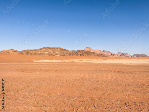 Wadi Rum Desert In Jordan. Yellow and Orange Desert Sand under the Blue Sky