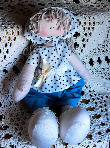 a decorative doll in a costume