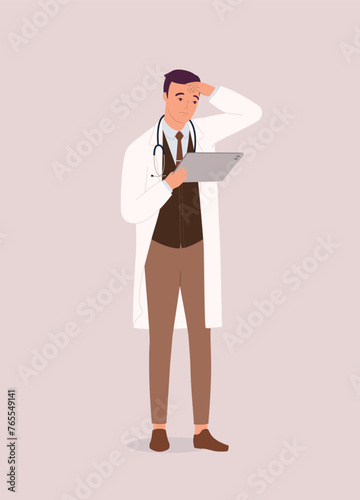 One Male Doctor Looking At His Digital Tablet With Worried Face. Full Length.
