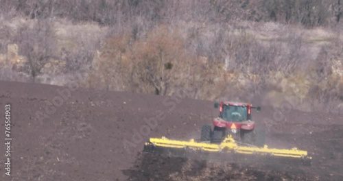 Field Work: Tractor Cultivates Land in Preparation for Planting