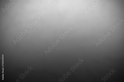 Blur of dark gray black slate background or texture