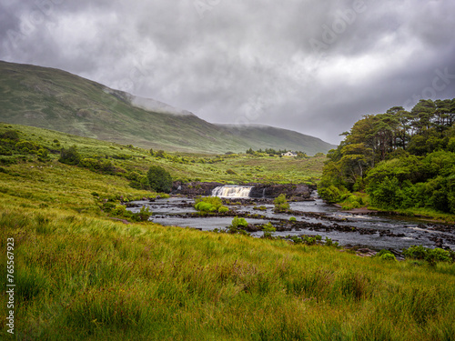 Aasleagh falls and the Erriff River -  River Flowing Through Lush Green Valley photo