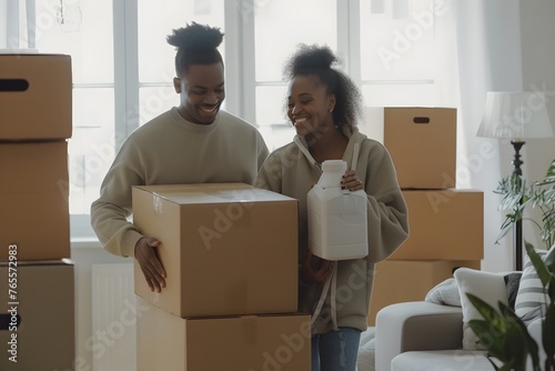 Moving Merriment: Cheerful Homeowners Busy Unpacking Cardboard Boxes, Adding a Touch of Happiness and Anticipation to Their New Home