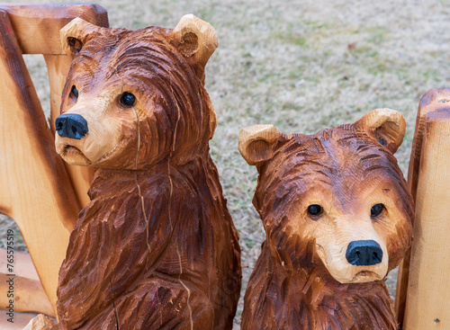 Closeup of wooden carved bears.