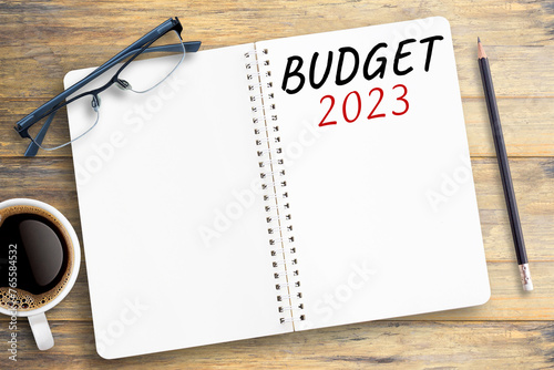 BUDGET 2023,Text on notebook in office desk workplace background. photo