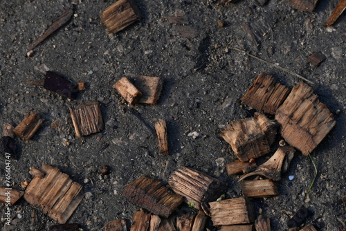 close up of a bunch of wood parts on the ground