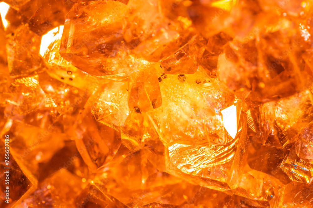Golden crystal mineral stone. Gems. Mineral crystals in the natural environment. Texture of precious and semiprecious stones. Seamless background with copy space. Golden crystal mineral stone. Gems. Mineral crystals in the natural environment. Texture of precious and semiprecious stones. Seamless background with copy space.