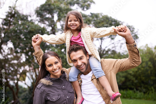 Mom, dad and child in portrait in park with love, bonding and support at outdoor family adventure. Smile, parents and girl on playful walk in garden together with happy man, woman and kid in nature