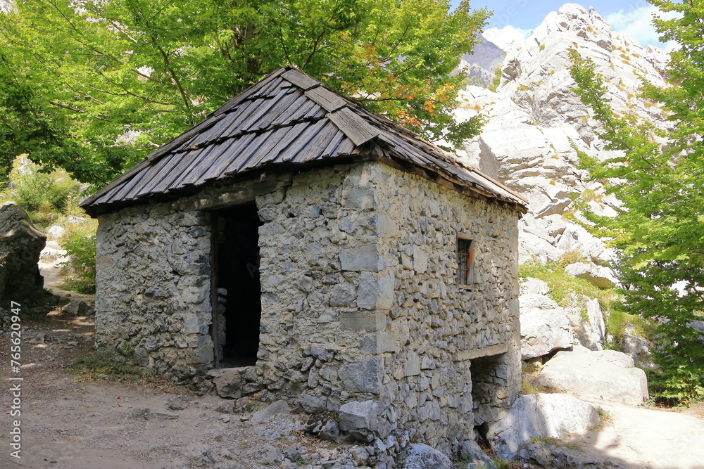 House and bridge to popular tourist attraction in Valbona valley, Albania, a Mulliri i Vjeter old mill house House and bridge to popular tourist attraction in Valbona valley, Albania, a Mulliri i Vjeter old mill house