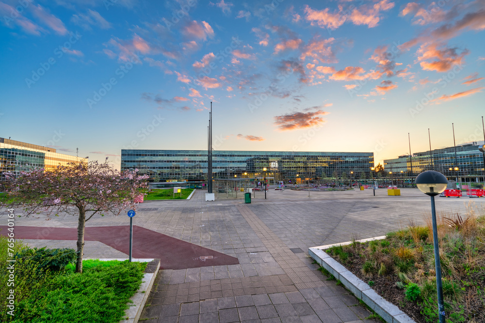 Train station square in Milton Keynes at sunset, England