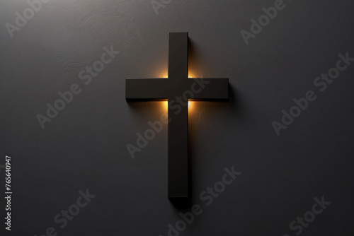 Simple black cross on a dark background with spotlight