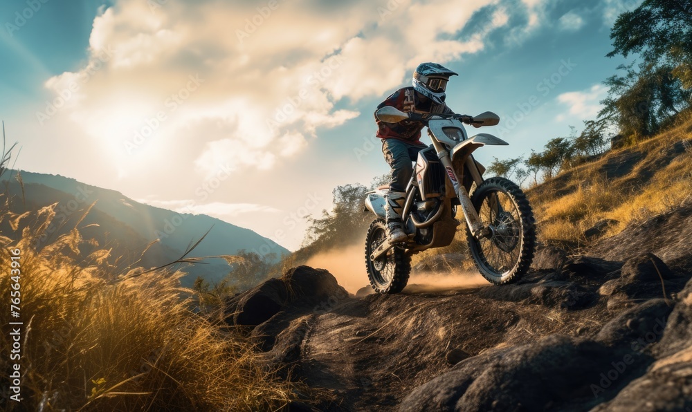 Back view of man riding a off-road motorcycle, going up to steep cliff. Back view of man riding a off-road motorcycle, going up to steep cliff.