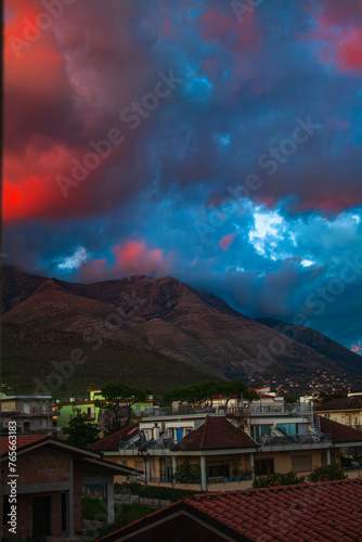 Red clouds and banks over Mount Altino photo