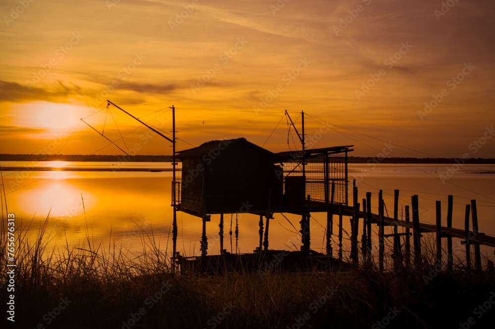 sunset at Pialassa Baiona near Marina Romean (Italy) sunset at Pialassa Baiona near Marina Romean (Italy)