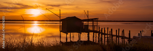 sunset at Pialassa Baiona near Marina Romean (Italy) photo