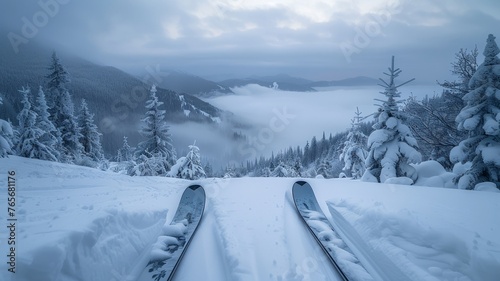 Overcast skies casting soft glow on solitary skis in winter panorama © Putra