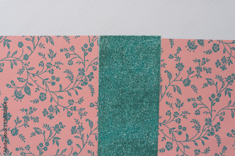 decorative pink paper with floral pattern and a stripe of glitter paper decorative pink paper with floral pattern and a stripe of glitter paper