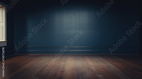 Empty room with wooden floor and navy wall with natural shadow from window. © Alpa
