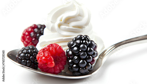 Raspberry and wildberry with whipped cream on a spoon isolated on white background photo