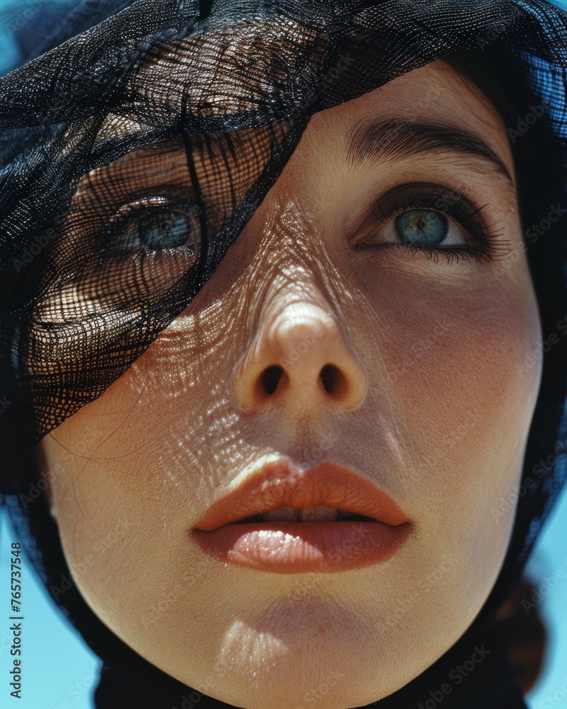 Fototapeta premium Elegant Woman with Black Veil, Classic Beauty Portrait