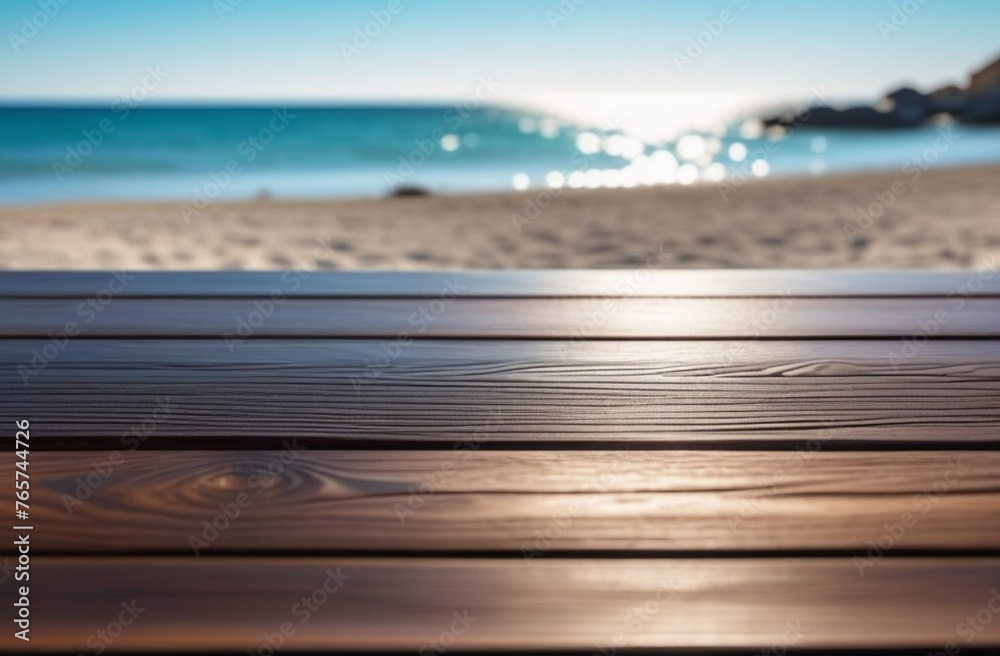 wooden table on the beach with the sea as a backdrop